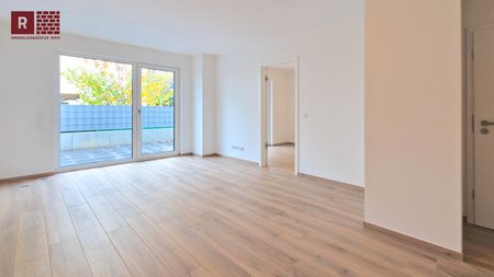 Moderne EG-Wohnung mit Terrasse, hochwertiger Ausstattung und großen Keller in zentraler Lage - Foto 2