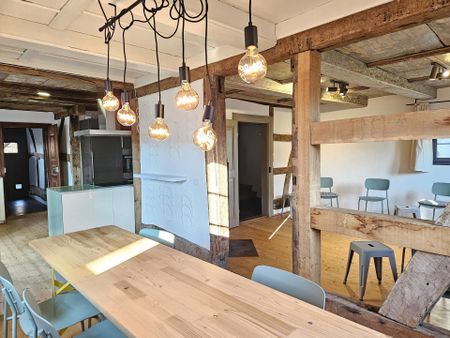 Modernes Riegelhaus mit bewegender Geschichte im Dorfzentrum - Photo 3