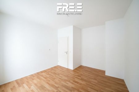 ZENTRAL | Wohnen direkt am Rathausplatz, aber mit Ausrichtung in den ruhigen Hof! - Foto 2