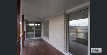 Stylish Four-Bedroom Home with Contemporary Features - Photo 2