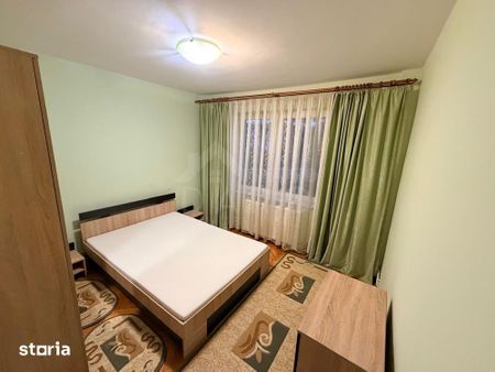 Apartament de inchiriat 3 camere, 2 bai. -situat pe strada Livezeni - Photo 2