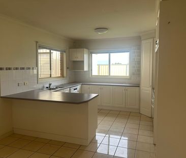 Comfortable Family Living with Excellent Storage & Parking - Photo 5