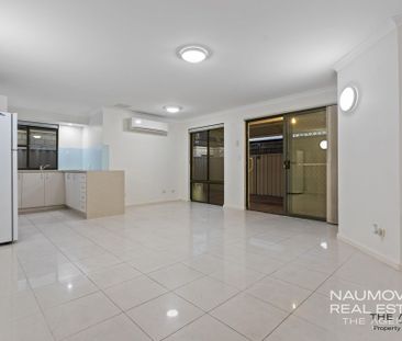 Modern Comfort and Convenience in a Private Rear Setting - Photo 2