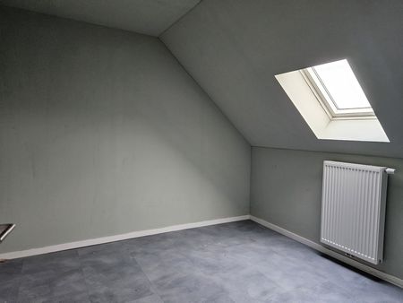 Ruime gezinswoning met tuin en carport in centrum - Photo 4