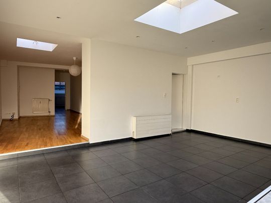 Verzorgd gelijkvloers 1-slpk appartement met tuin - Photo 1