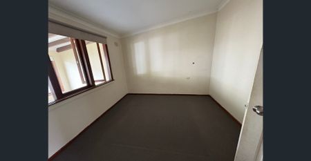 Spacious Family Home with Sunlit Charm - Photo 2