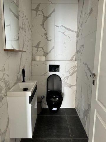 Nieuwbouw appartement van 120 m² op het gelijkvloers met 2 slaapkamers. - Photo 5