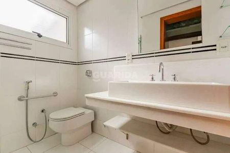 Casa Residencial com 4 dormitórios, sendo 2 suítes, e 4 vagas de garagem no Bairro Cristal - COD: 21820 - Photo 4