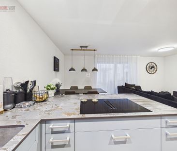 Exclusive 3.5-room garden apartment with heated hobby room - Photo 2