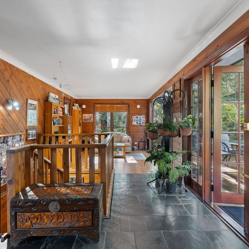 TOP OF THE TREE TOPS HOME WITH LAKE VIEWS - Photo 1