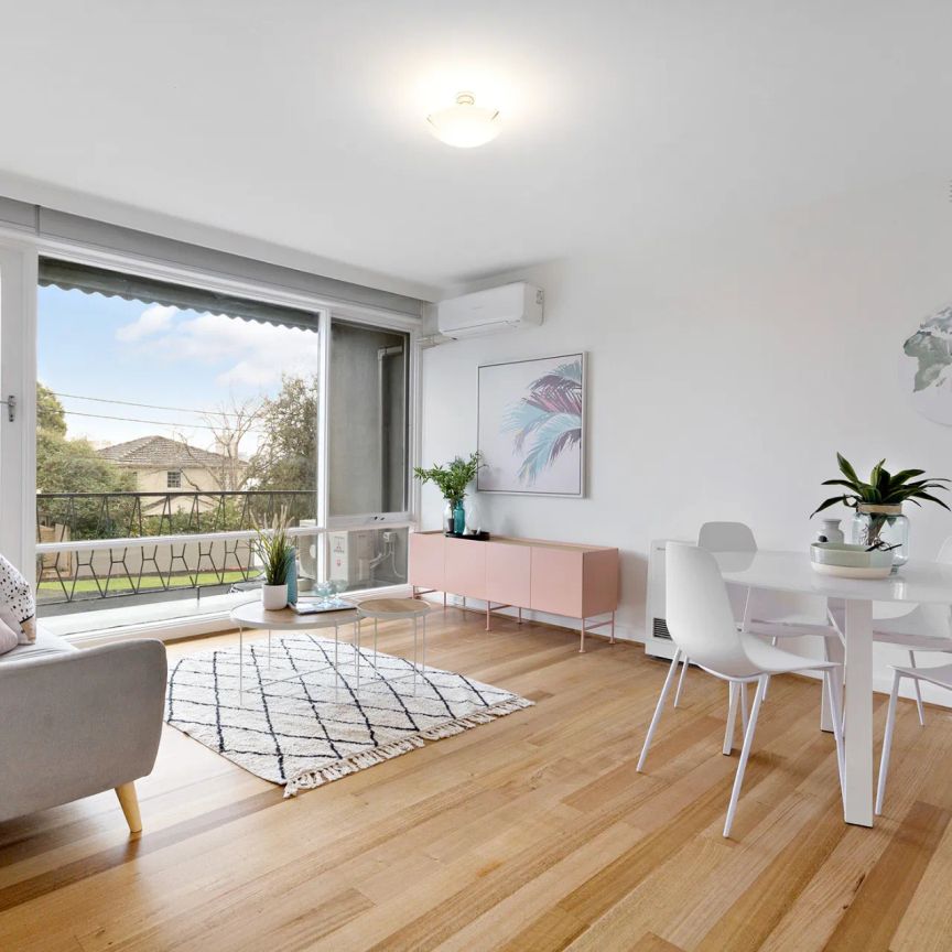 Spacious and sun-soaked with an enviable address - Photo 1