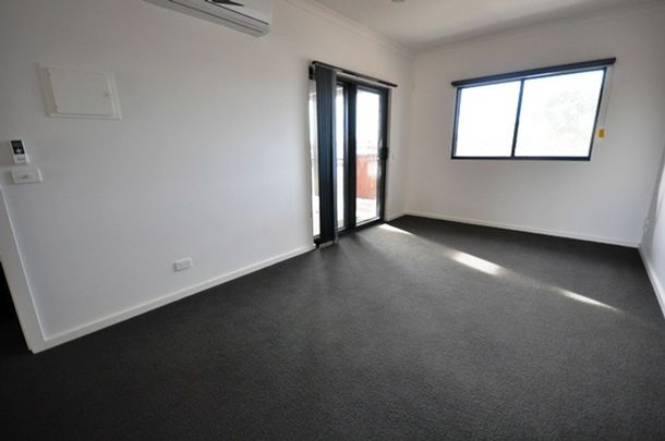 LOW MAINTENANCE - Upstairs 1x1 Modern Unit - Photo 1