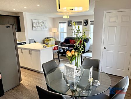 10799 Cityscape Drive NE | Townhouse | 3-bedroom, 2.5-bathroom | Double Garage - Photo 4