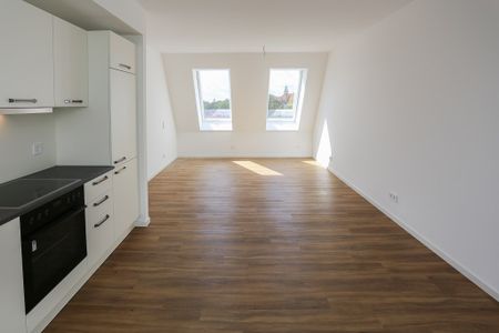 Leben über den Dächern - 2-Zimmer-Dachgeschosswohnung mit großzügiger Terrasse - Foto 2