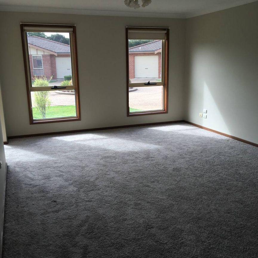 LOW MAINTENANCE, CENTRAL CONVENIENCE - Photo 1