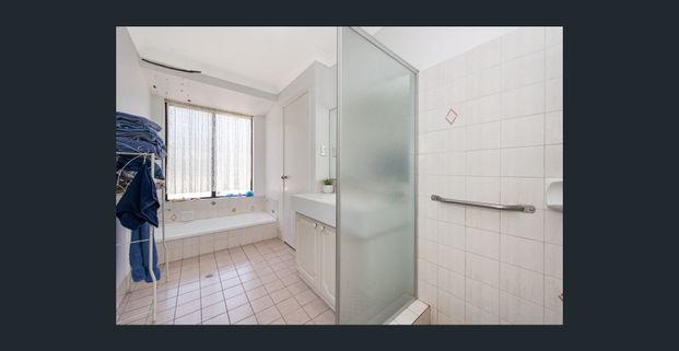 Family Home with Ample Parking + Side Access - Photo 1