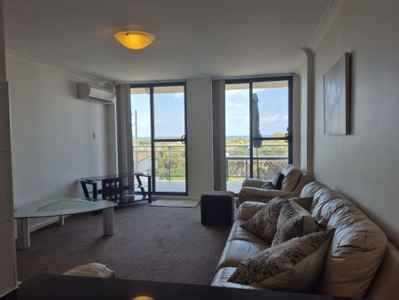 Immaculate Two-Bedroom Furnished Unit at the Entrance North - Photo 5