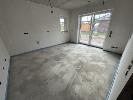 Neubauwohnung im Erdgeschoss mit großer Garage und Garten - Foto 5