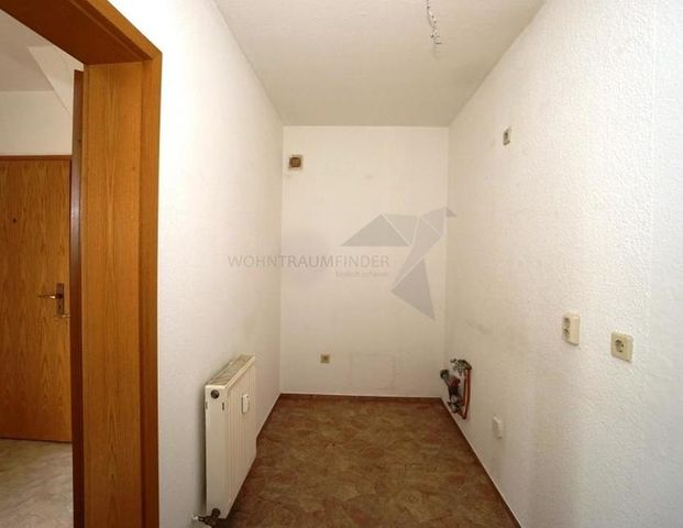 Gemütliche 2-Zimmer-Wohnung mit Tageslichtbad und Sichtbalken - Photo 1