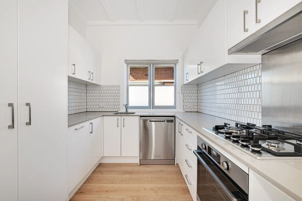 Beautifully Renovated Two-Bedroom Semi in Ultra-Convenient Location - Photo 1