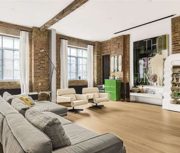 A stunning two/three bedroom recently renovated converted warehouse apartment in central Clerkenwell. - Photo 2