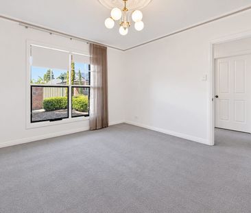 Comfortable Two-Bedroom Home in a Great Location - Photo 1