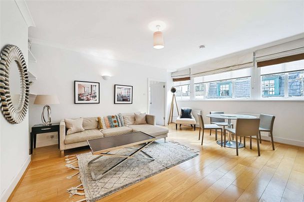 A beautifully presented and recently renovated apartment set in a picturesque Belgravia Mews. - Photo 1