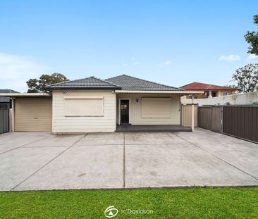 Spacious Four-Bedroom Home with Renovated Kitchen & Generous Backyard - Photo 5