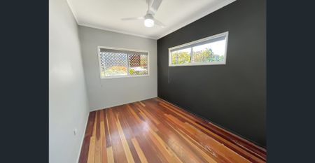 Neat 2-Bedroom Unit with Fenced Yard - Photo 2