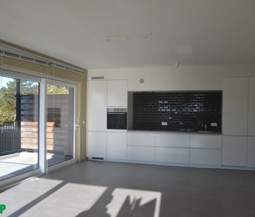 Centraal gelegen recent, lichtrijk appartement met 2 slaapkamers - Photo 3