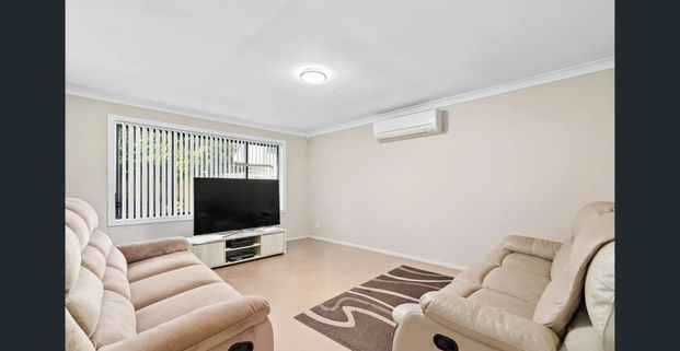 EXCEPTIONAL FAMILY LIVING IN A SOUGHT-AFTER LOCATION! - Photo 1