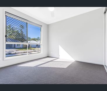 Family Haven with Bushland Backdrop and Modern Living! - Photo 2