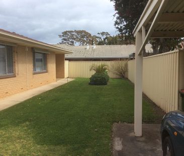 2 bedroom unit with private rear yard in popular location - Photo 2