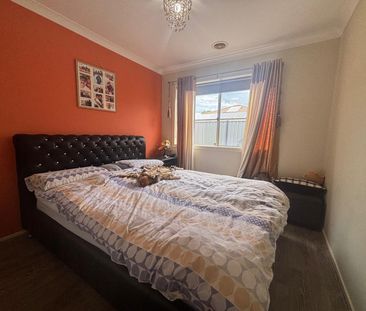 Elegant Home with Modern Amenities and Secure Garage - Photo 3