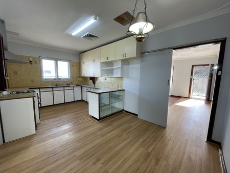 Freshly Updated Home with Spacious Living and Ideal Location! - Photo 2