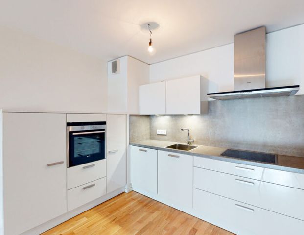 Moderne Erdgeschosswohnung mit Terrasse und EBK - Foto 1