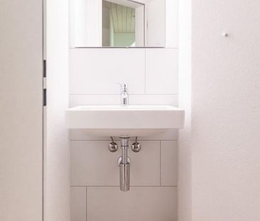 Heimelige Dachwohnung mit Wintergarten - Foto 3