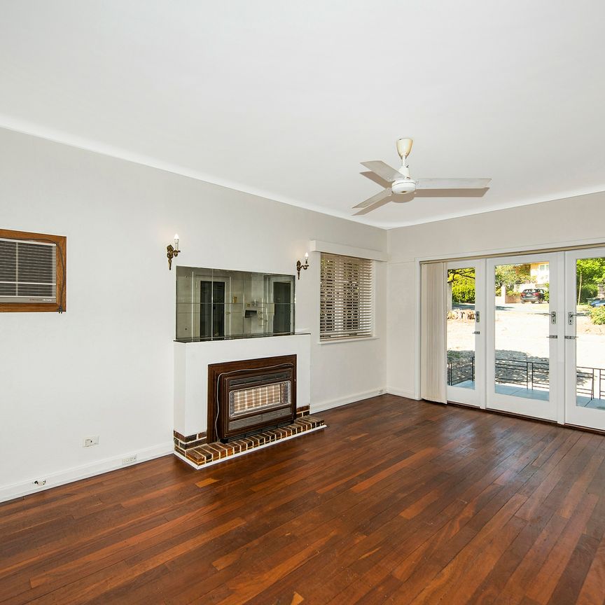 Stunning Family Home with Expansive Yard Space! - Photo 1