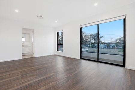 Near new, spacious four bedroom duplex backing onto a reserve - Photo 2