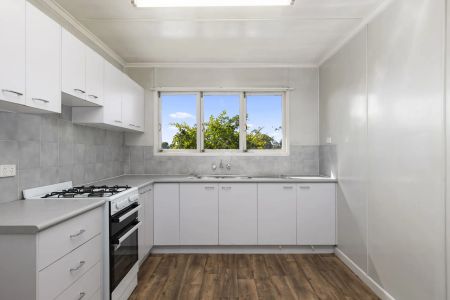 Neat & Tidy 4-Bedroom, 2-Bathroom Home in Stafford Heights – Available Now! - Photo 3