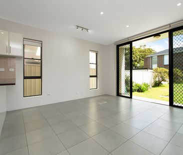 Four-Bedroom Duplex Close to Beach - Photo 1