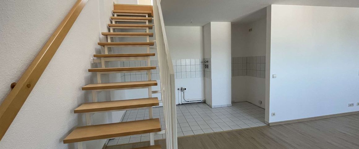 2-Zimmer-Maisonettewohnung mit offener Küche in zentraler Lage! - Photo 1
