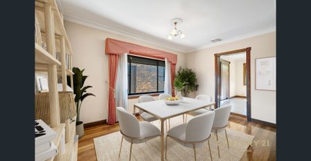 Stylish 4-Bedroom Home with Huge Garage and Family-Friendly Backyard - Photo 4