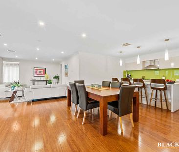 Welcoming Family Home with Open Living Spaces and Home Office - Photo 5