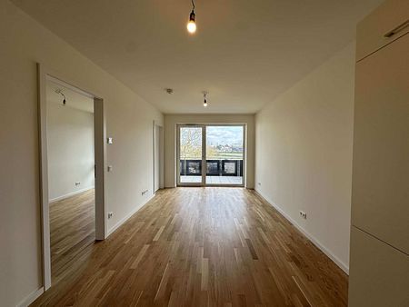 KfW 40-Neubau-Wohnung mit EBK, Duschbad, Ostbalkon, HWR, Echtholzparkett, Fahrstuhl, Tiefgarage - Foto 4