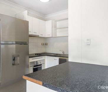 Spacious 3-Bedroom Unit in Great Location - Photo 6