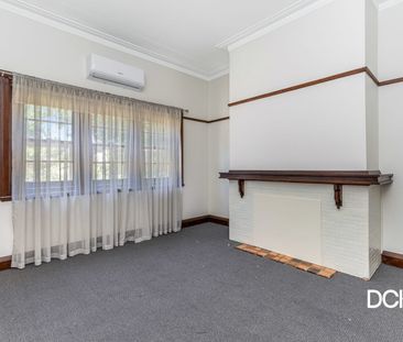 Character Home in Perfect Flora Hill Location - Photo 1