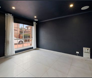 Stylish & Spacious Freestanding 4-Bedroom Townhouse - Photo 6
