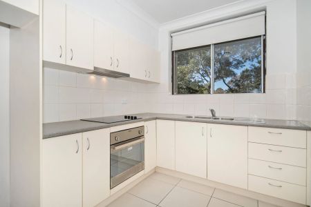 Spacious Two Bedroom Apartment with Parking in Ideal Location - Photo 3