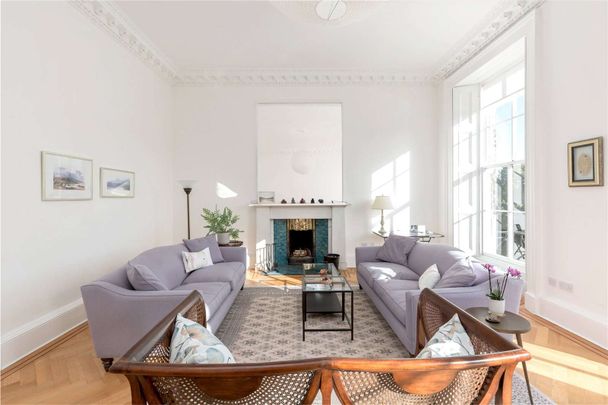 Immaculately presented unfurnished townhouse apartment over ground and first floors, renovated to an exceptional standard and with a wonderful west facing garden. - Photo 1